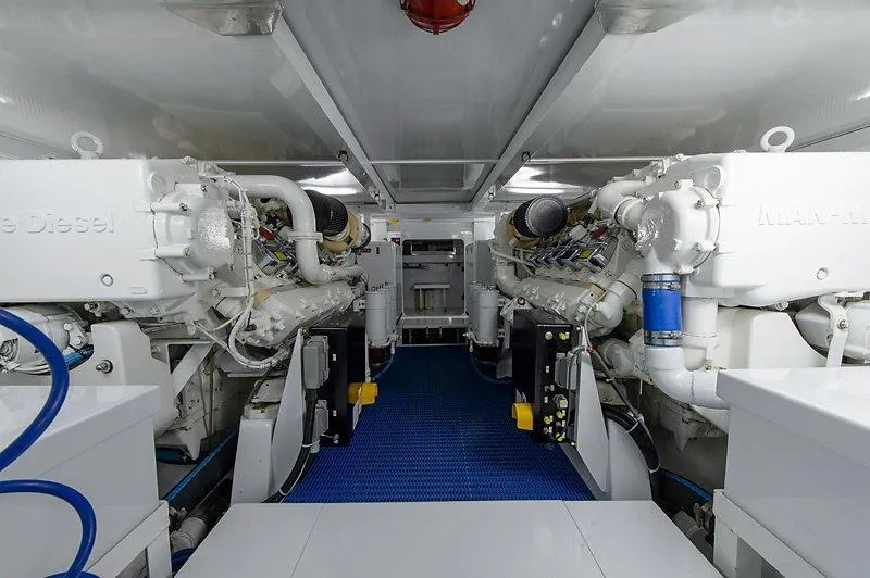 Slide: The Image of Engine room of a 1987 Custom Carolina Merritt boat, clean and well-organized. - 48