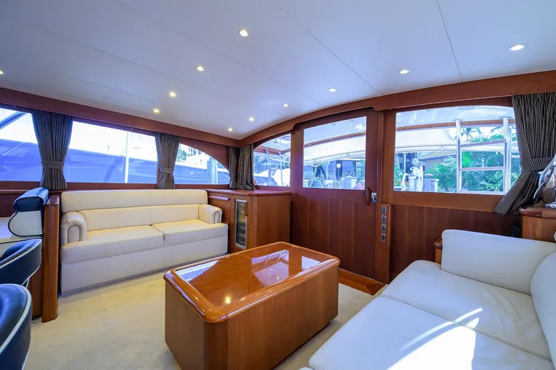 Slide: The Image of Luxurious 1987 Merritt Boat Works Sport Fisherman interior with elegant seating and wooden accents. - 26