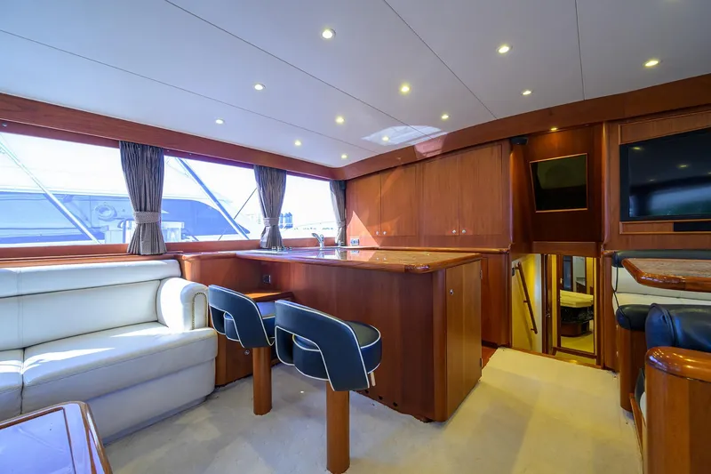 Slide: The Image of Luxurious interior of 1987 Merritt Boat Works Sport Fisherman with elegant wood finishes. - 28