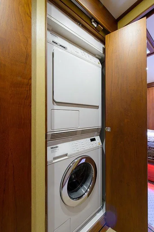 Slide: The Image of Built-in washer and dryer in 1987 Custom Carolina Merritt boat. - 33