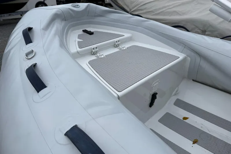 Slide: The Image of 2019 Highfield Classic 380 inflatable boat interior with storage compartments. - 5