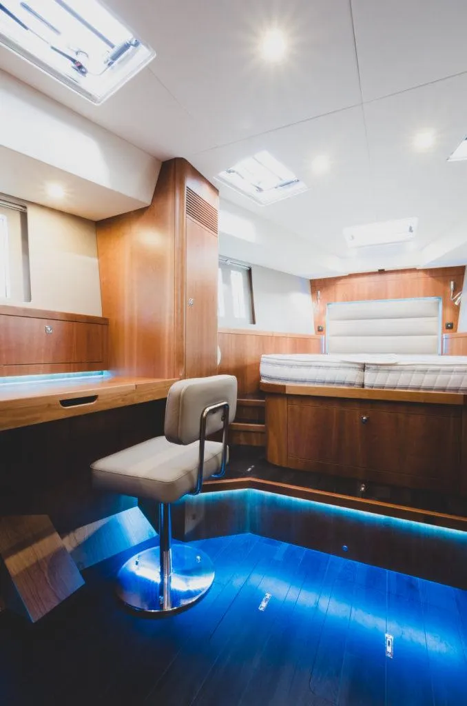 Slide: The Image of Luxurious interior of 2025 Southerly 480 yacht with modern furnishings and ambient lighting. - 24