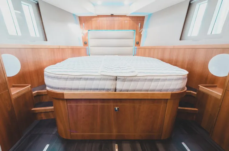 Slide: The Image of Luxurious cabin interior of 2025 Southerly 480 yacht with a comfortable bed. - 25
