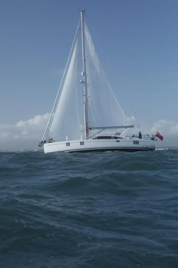 Slide: The Image of 2025 Southerly 480 sailboat navigating open waters under clear skies. - 32