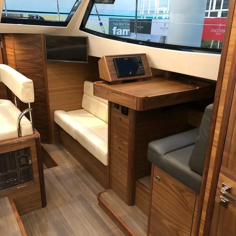 Slide: The Image of Luxurious interior of 2025 Southerly 480 yacht with wood finish and modern seating. - 37