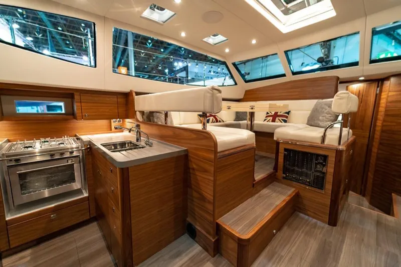 Slide: The Image of Luxurious interior of 2025 Southerly 480 yacht with modern kitchen and seating area. - 39