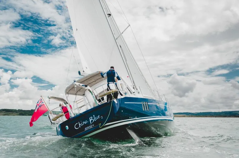Slide: The Image of Sailing yacht Southerly 480, 2025 model, navigating open waters under cloudy skies. - 4