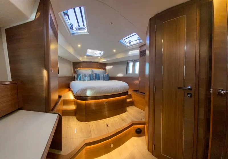 Slide: The Image of Luxurious interior of 2025 Southerly 480 yacht with elegant wood finishes and skylights. - 43