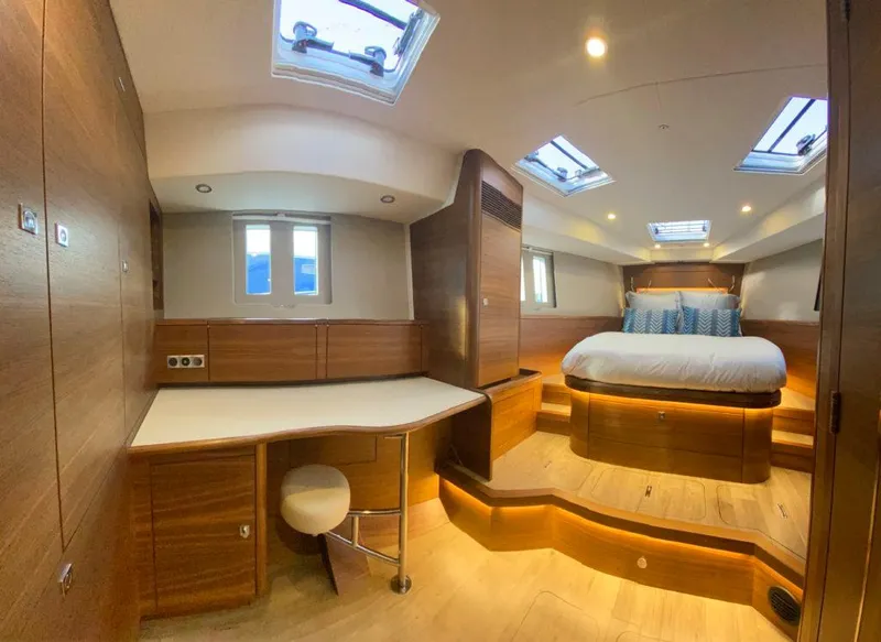Slide: The Image of Luxurious interior of 2025 Southerly 480 yacht with modern wood finish and skylights. - 44