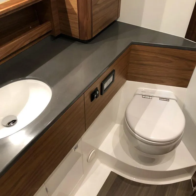 Slide: The Image of Modern bathroom in 2025 Southerly 480 yacht with sleek wood and stainless steel design. - 48