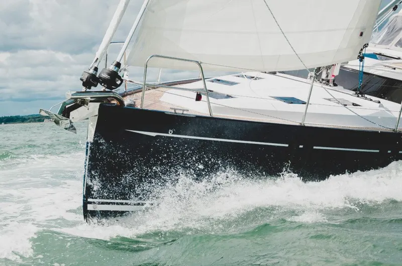 Slide: The Image of Sailing yacht Southerly 480, 2025 model, cutting through ocean waves. - 7