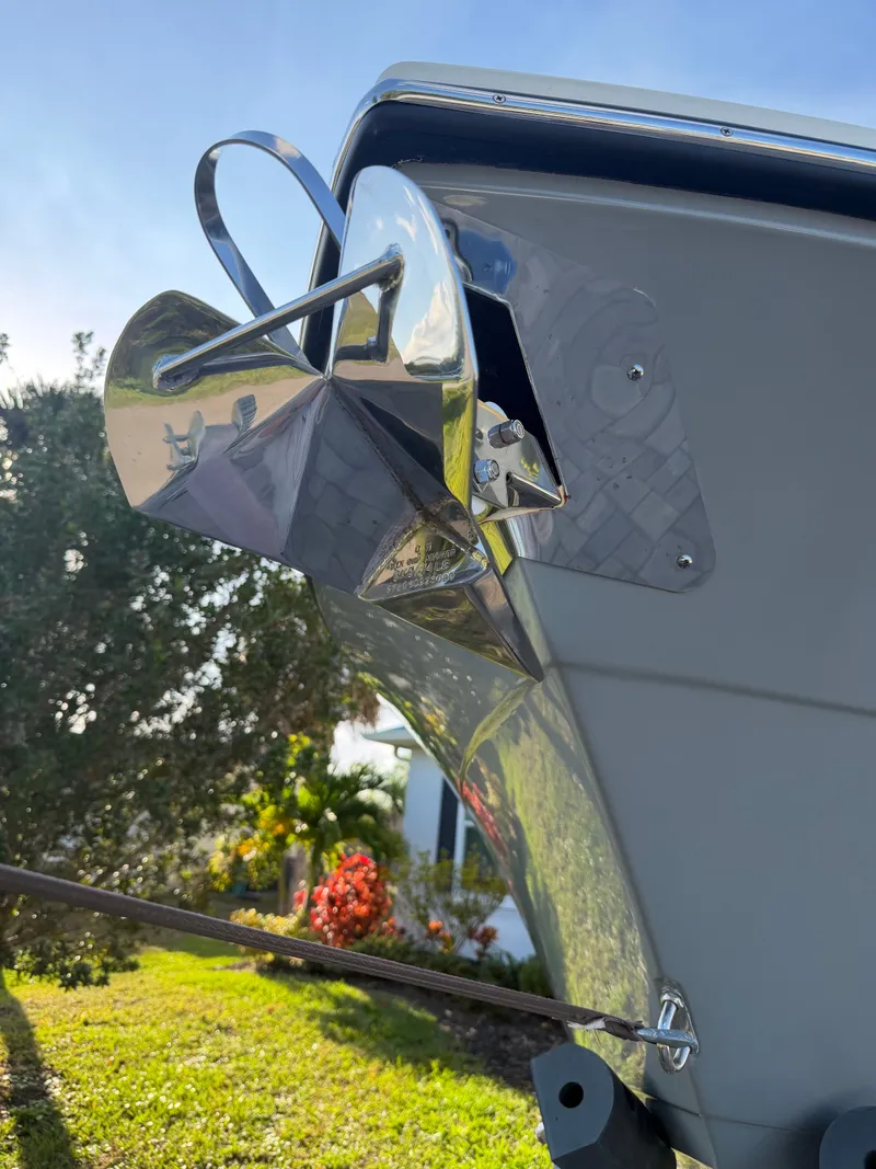 Slide: The Image of Close-up of the anchor on a 2024 Cobia 240 Center Console boat. - 20