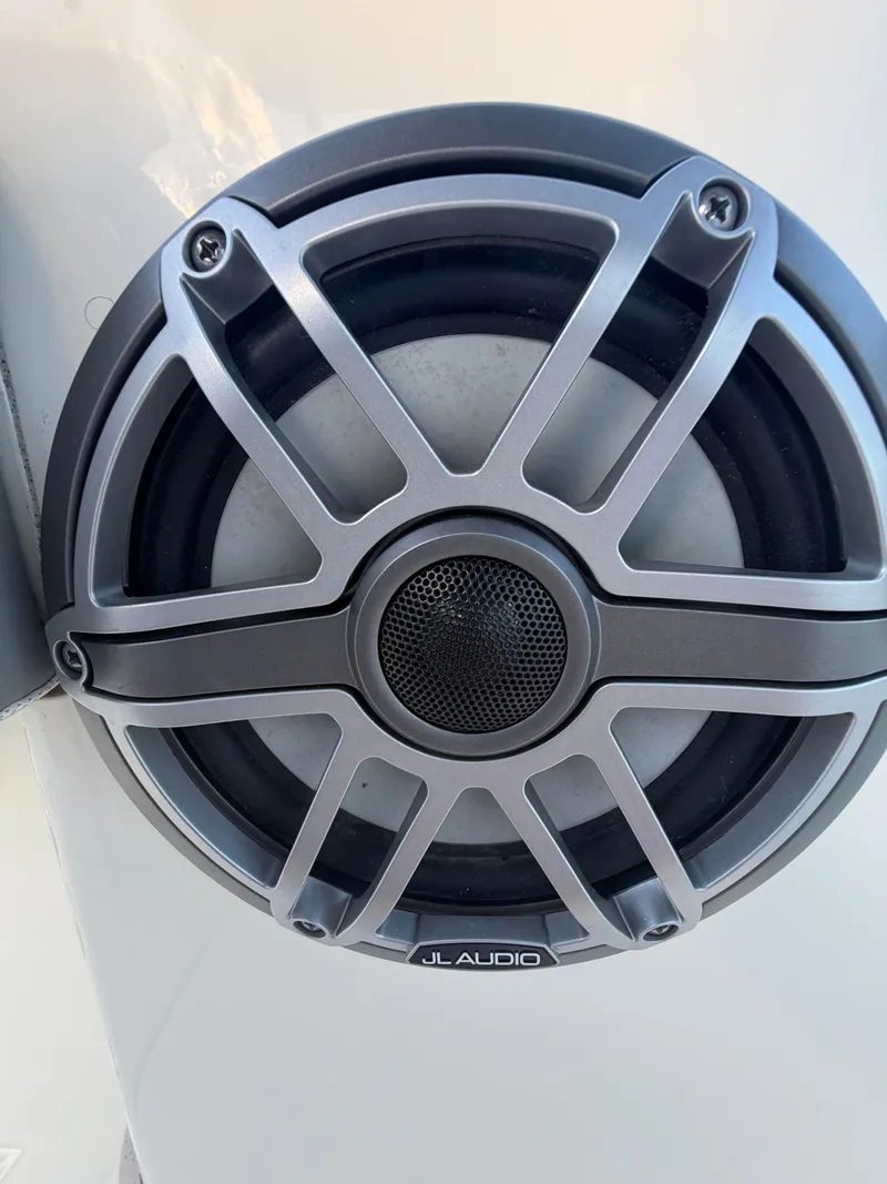Slide: The Image of JL Audio speaker on 2024 Cobia 240 Center Console. - 23