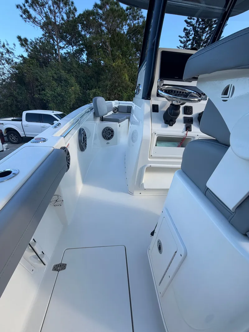 Slide: The Image of Interior view of 2024 Cobia 240 Center Console boat. - 6