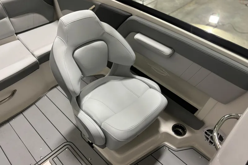 Slide: The Image of 2026 Chaparral 21 SSi boat interior with sleek, modern seating design. - 14