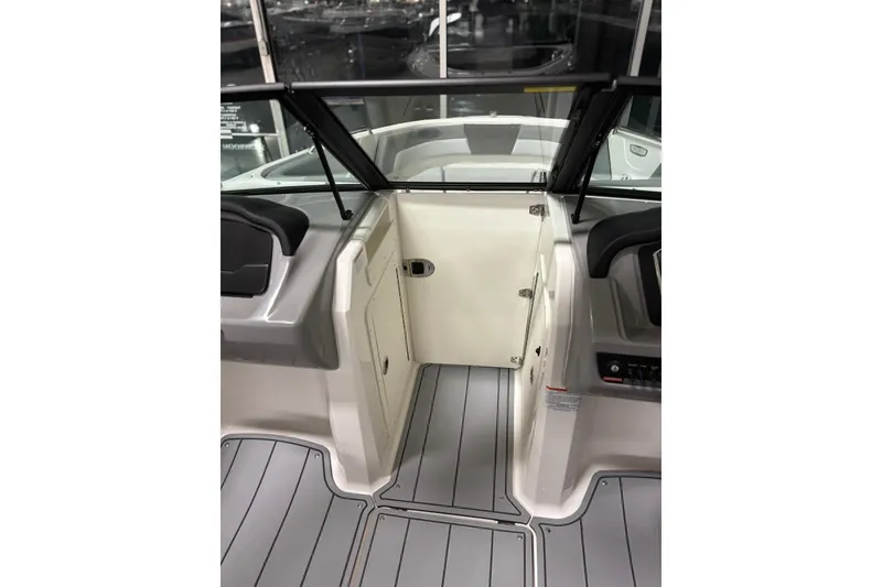 Slide: The Image of 2026 Chaparral 21 SSi boat interior with sleek design and modern features. - 21