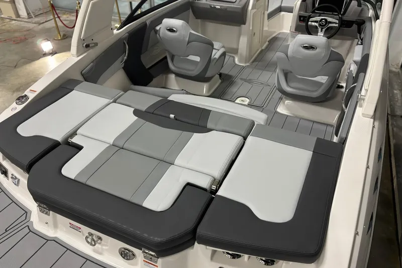Slide: The Image of 2026 Chaparral 21 SSi boat interior with gray seating and modern design. - 6