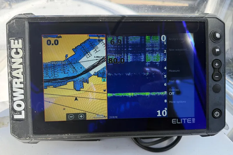 Slide: The Image of Lowrance Elite fishfinder displaying sonar and map on a 2003 Kenner 21 V Tunnel boat. - 14