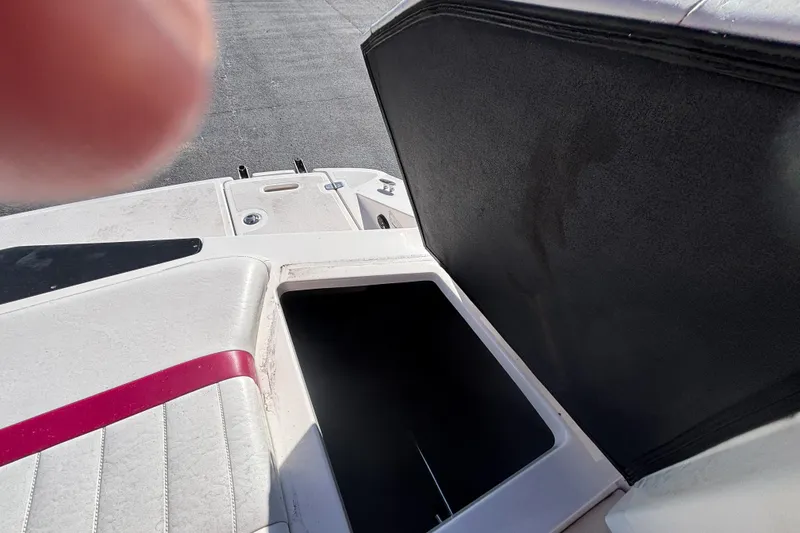 Slide: The Image of Open storage compartment on a 2008 Regal 2000 Bowrider boat. - 34