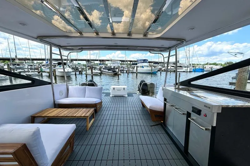 Slide: The Image of Luxurious 2019 Gemini Freestyle 399 Power yacht interior with marina view. - 6