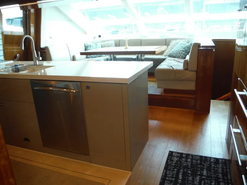 Slide: The Image of Luxurious Horizon E88 yacht interior with ocean view, featuring modern amenities and sleek design. - 24