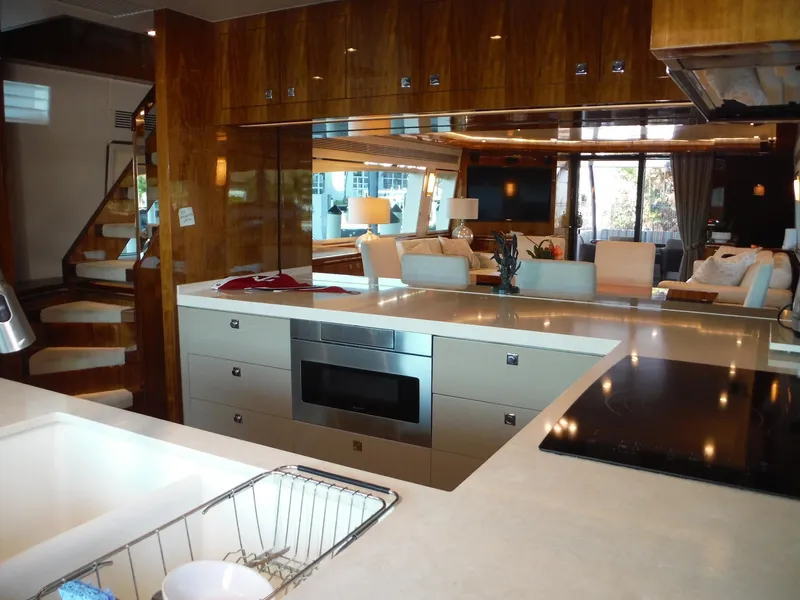 Slide: The Image of Engine room of 2015 Horizon E88 yacht with fire suppression system and control panels. - 31