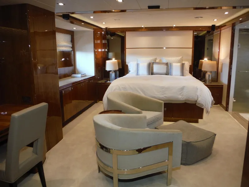 Slide: The Image of Small cabin interior of 2015 Horizon E88 yacht with TV and wooden decor. - 36