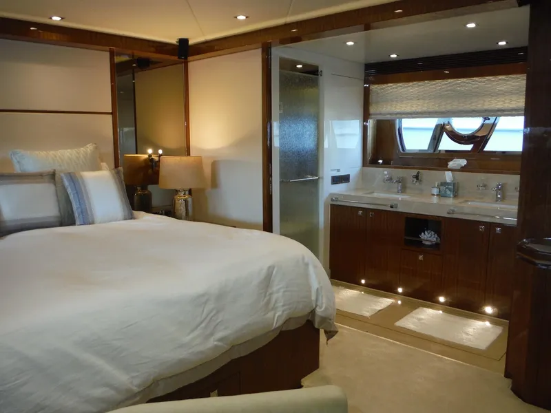 Slide: The Image of Luxurious 2015 Horizon E88 yacht cabin with wooden interior and cozy bunk beds. - 37