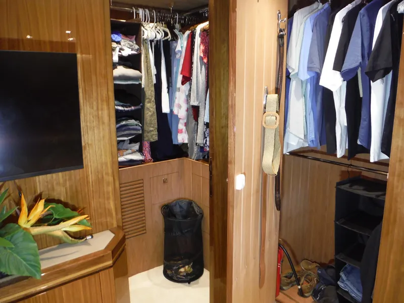 Slide: The Image of Luxurious interior of 2015 Horizon E88 yacht with plush seating and panoramic windows. - 44