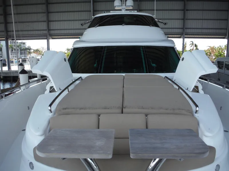 Slide: The Image of Luxurious interior of 2015 Horizon E88 yacht with elegant white sofas and ocean view. - 6