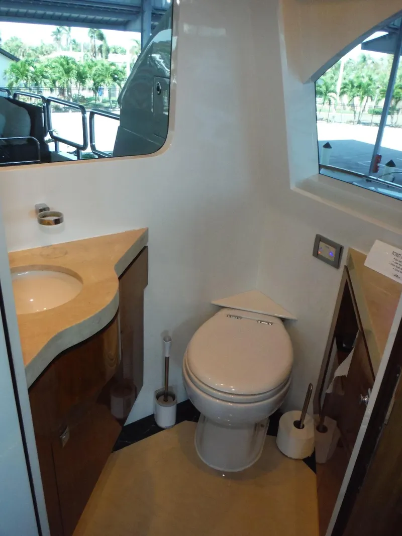 Slide: The Image of Interior view of 2015 Horizon E88 yacht with ocean backdrop and TV display. - 68