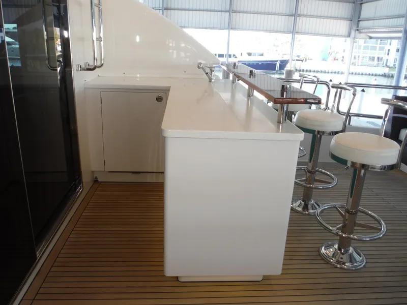 Slide: The Image of 2015 Horizon E88 luxury yacht on open sea. - 71