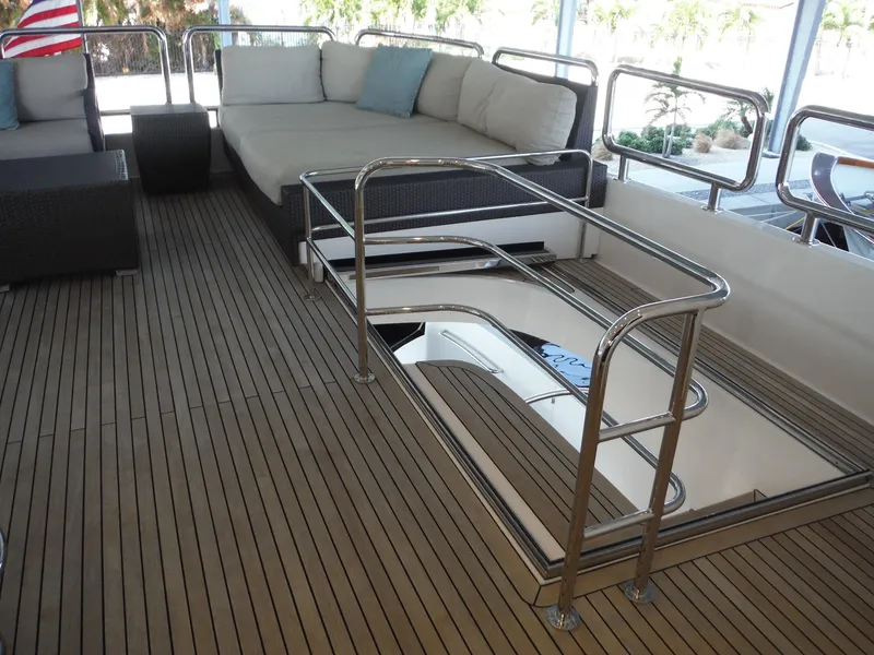 Slide: The Image of Luxurious 2015 Horizon E88 yacht cruising on clear blue ocean waters. - 73