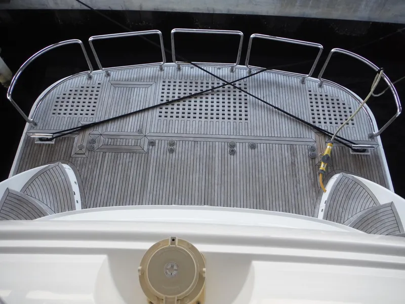 Slide: The Image of Luxurious 2015 Horizon E88 yacht cruising on clear blue ocean waters. - 74