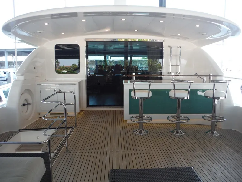 Slide: The Image of Luxurious 2015 Horizon E88 yacht cruising on clear blue ocean waters. - 75