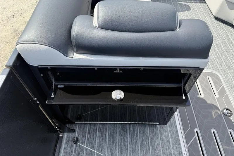 Slide: The Image of 2026 Premier 230 Intrigue RF boat seat with open storage compartment. - 12