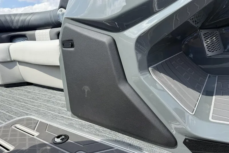Slide: The Image of Interior of 2026 Premier 230 Intrigue RF boat, featuring sleek seating and flooring. - 15