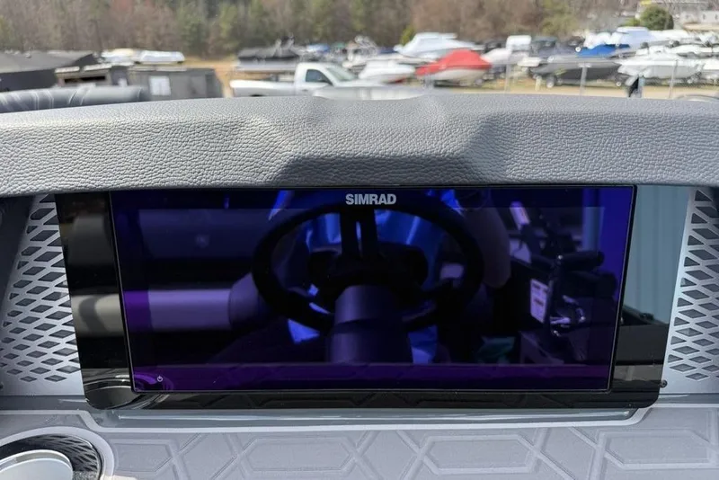 Slide: The Image of Simrad display on 2026 Premier 230 Intrigue RF boat dashboard, showcasing modern navigation technology. - 21
