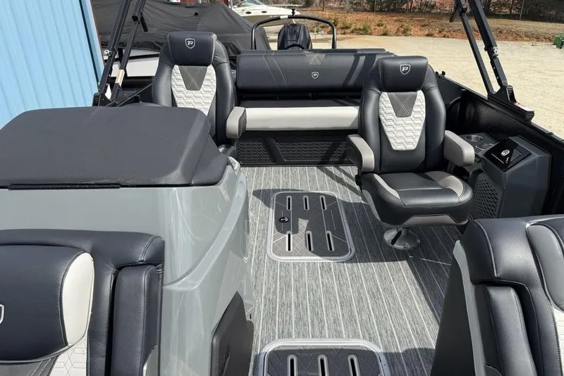 Slide: The Image of Luxurious interior of 2026 Premier 230 Intrigue RF pontoon boat with stylish seating. - 24