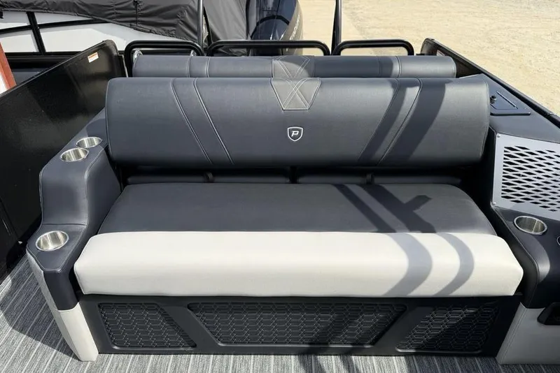 Slide: The Image of 2026 Premier 230 Intrigue RF boat seat with cup holders and stylish upholstery. - 26