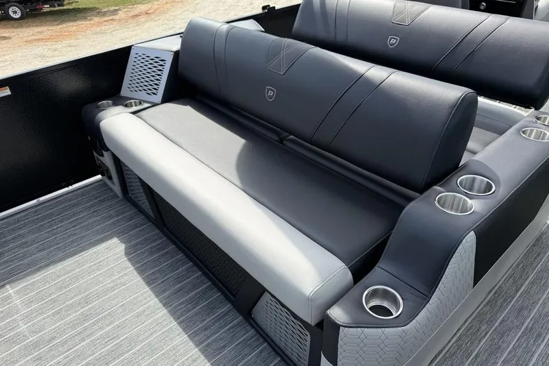 Slide: The Image of Luxurious seating on 2026 Premier 230 Intrigue RF boat with cup holders and stylish upholstery. - 28