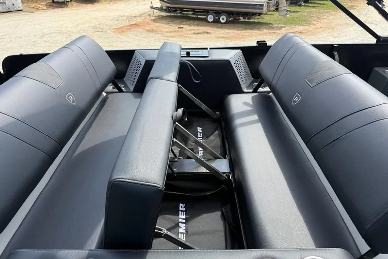Slide: The Image of 2026 Premier 230 Intrigue RF boat interior with sleek black seating and modern design. - 29