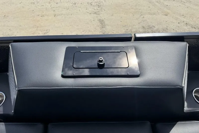 Slide: The Image of 2026 Premier 230 Intrigue RF boat dashboard with sleek black leather finish. - 34