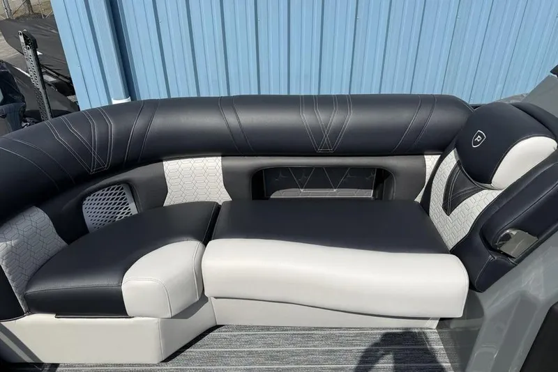Slide: The Image of Luxurious seating on 2026 Premier 230 Intrigue RF boat, featuring elegant black and white upholstery. - 6