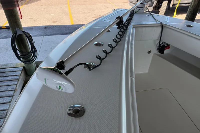 Slide: The Image of 2016 SeaVee 370Z boat deck with trolling motor and coiled cable. - 6
