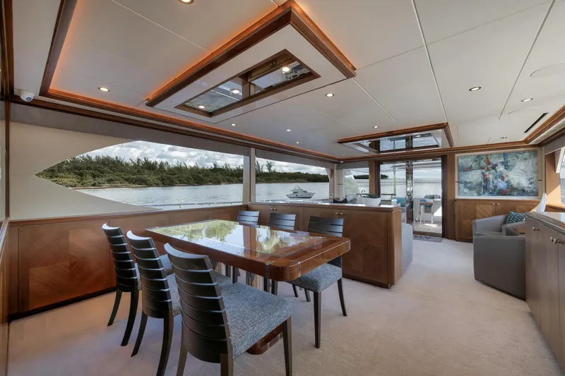 Slide: The Image of Luxurious interior of 2017 Ocean Alexander 85 E yacht with elegant dining area and scenic views. - 10