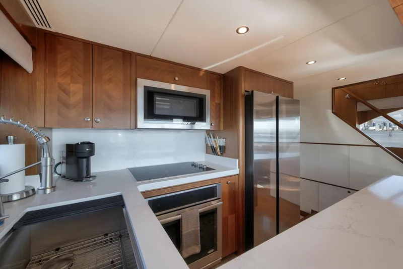 Slide: The Image of Luxurious kitchen in 2017 Ocean Alexander 85 E yacht with modern appliances. - 13
