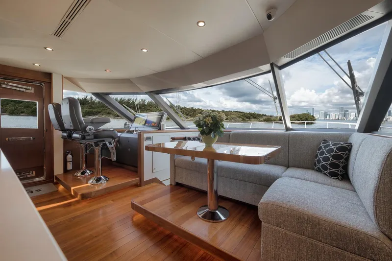 Slide: The Image of Luxurious interior of 2017 Ocean Alexander 85 E yacht with panoramic windows and elegant seating. - 15