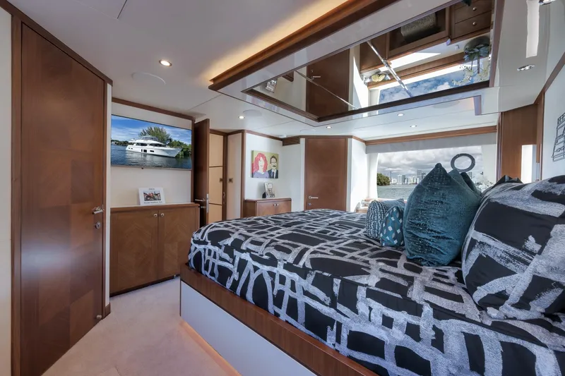 Slide: The Image of Luxurious bedroom interior of 2017 Ocean Alexander 85 E yacht with modern decor. - 26