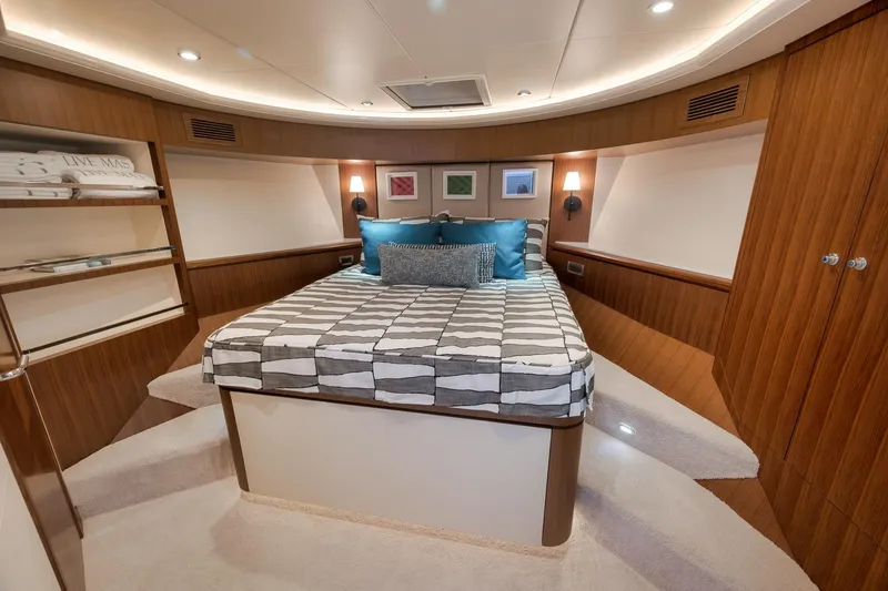 Slide: The Image of Luxurious bedroom interior of 2017 Ocean Alexander 85 E yacht with modern design and cozy ambiance. - 29